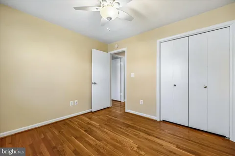 a view of a swimming pool with a yard