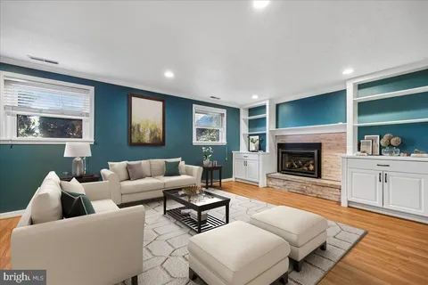 a view of a park with iron fence