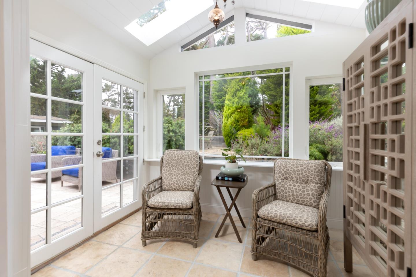 4106 Crest Road Pebble Beach, CA 93953 - Photo 15 of 43 a dining room with furniture and a window