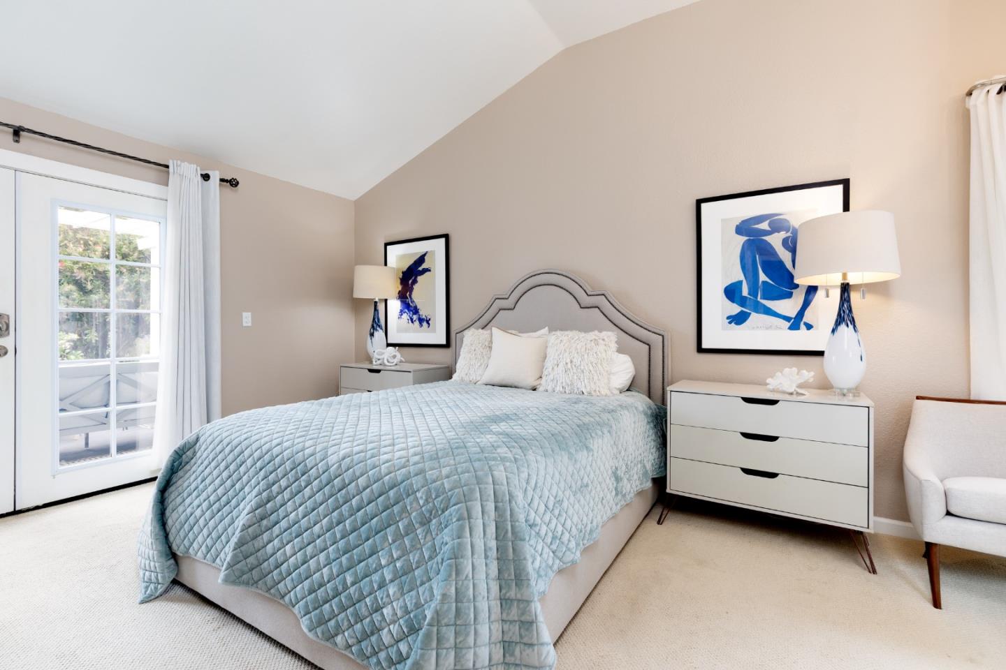 4106 Crest Road Pebble Beach, CA 93953 - Photo 18 of 43 a bedroom with a bed and a painting on the wall