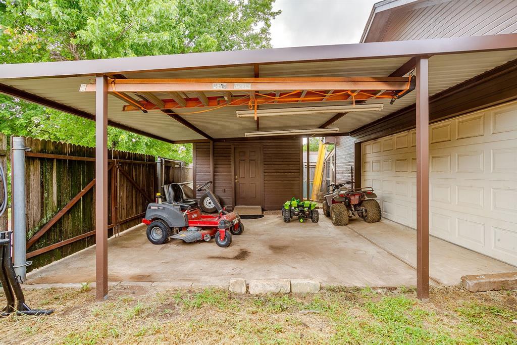 800 Poe Street Azle, TX 76020 - Photo 21 of 31 Carport and storage shed