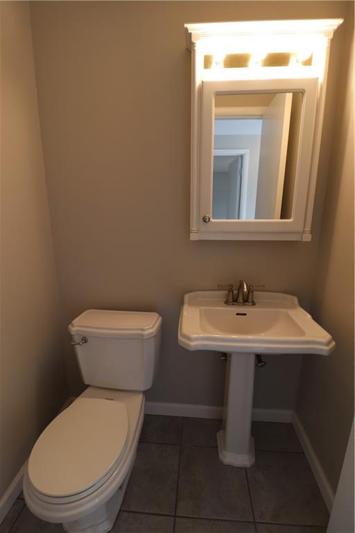 164 Friar Lane McMurray, PA 15317 - Photo 11 of 46 a bathroom with a toilet a sink and mirror