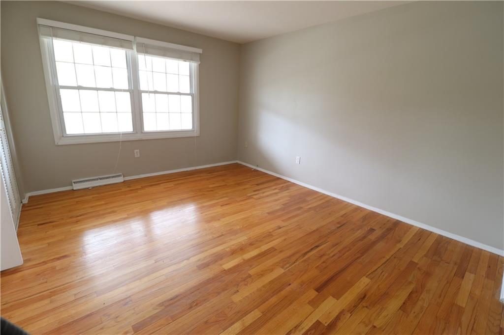 164 Friar Lane McMurray, PA 15317 - Photo 25 of 46 an empty room with wooden floor and windows