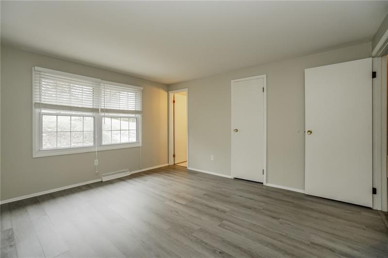 164 Friar Lane McMurray, PA 15317 - Photo 32 of 46 a view of an empty room with wooden floor and a window