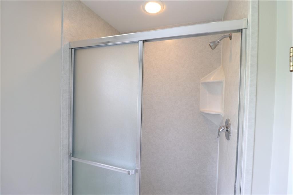 164 Friar Lane McMurray, PA 15317 - Photo 36 of 46 a bathroom with a glass shower door