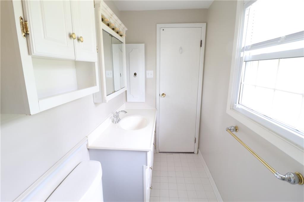 164 Friar Lane McMurray, PA 15317 - Photo 37 of 46 a bathroom with a sink and a mirror