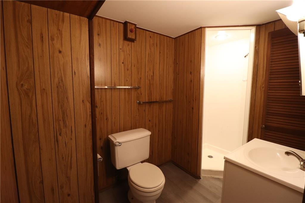 164 Friar Lane McMurray, PA 15317 - Photo 41 of 46 a white toilet sitting next to a bathroom sink