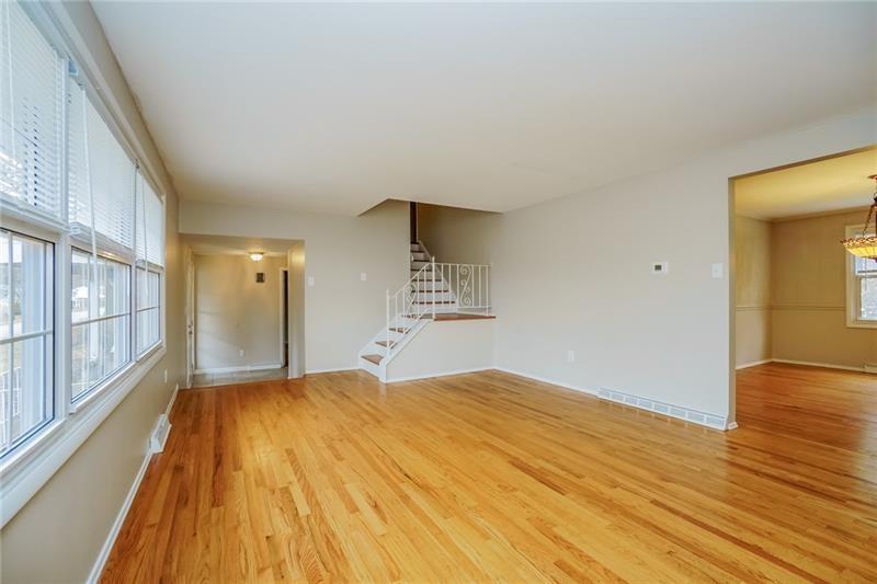 164 Friar Lane McMurray, PA 15317 - Photo 9 of 46 a bedroom with a bed and wooden floor