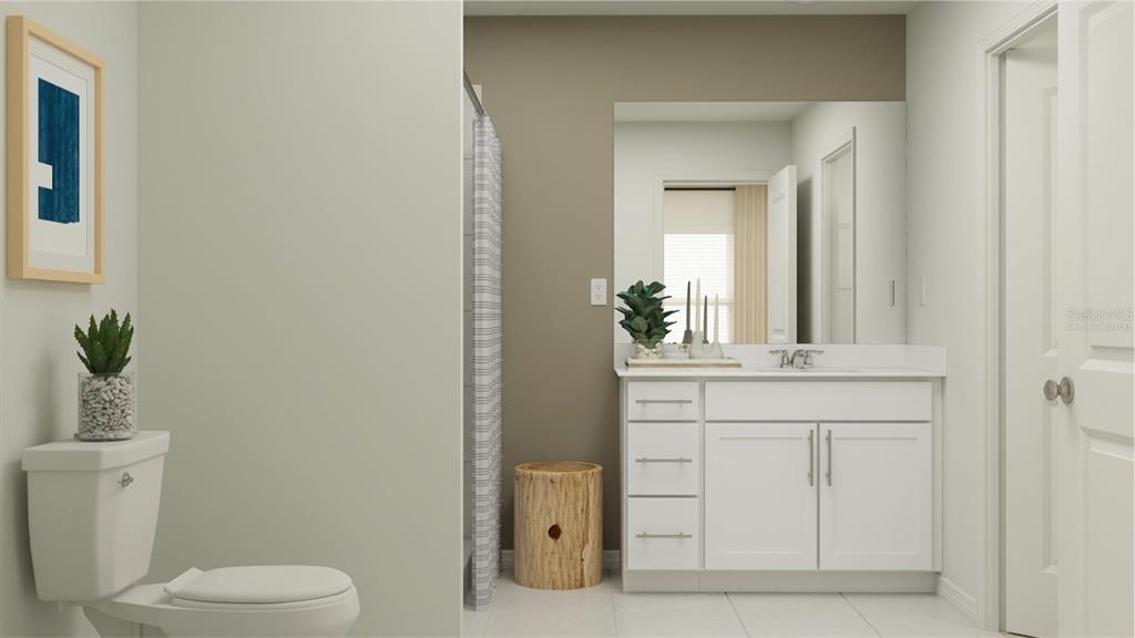 2481 Hallow Gdn Road Eustis, FL 32726 - Photo 6 of 13 a bathroom with a toilet sink and mirror