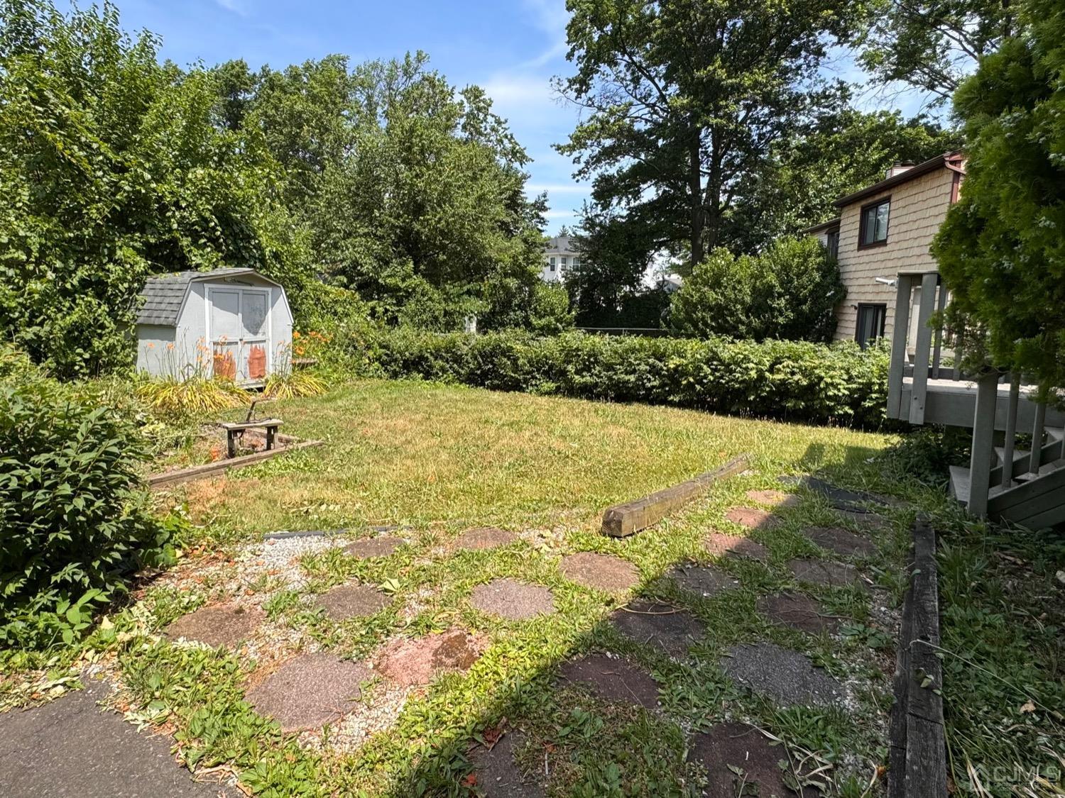 155 Jefferson Boulevard Edison, NJ 08817 - Photo 19 of 21 a view of a house with a yard