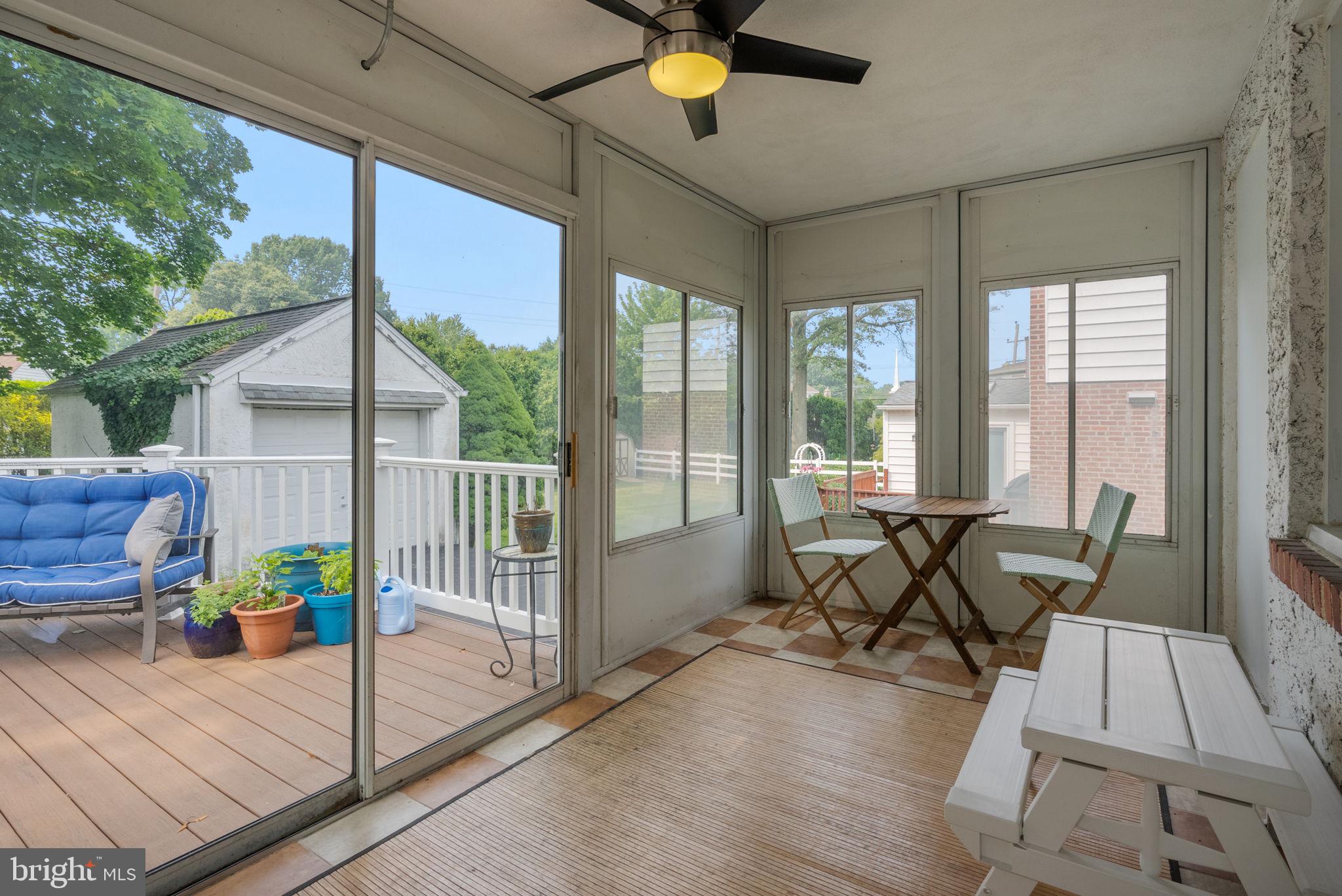 116 South Highland Road Springfield, PA 19064 - Photo 25 of 42 a view of a patio with a dining table and chairs