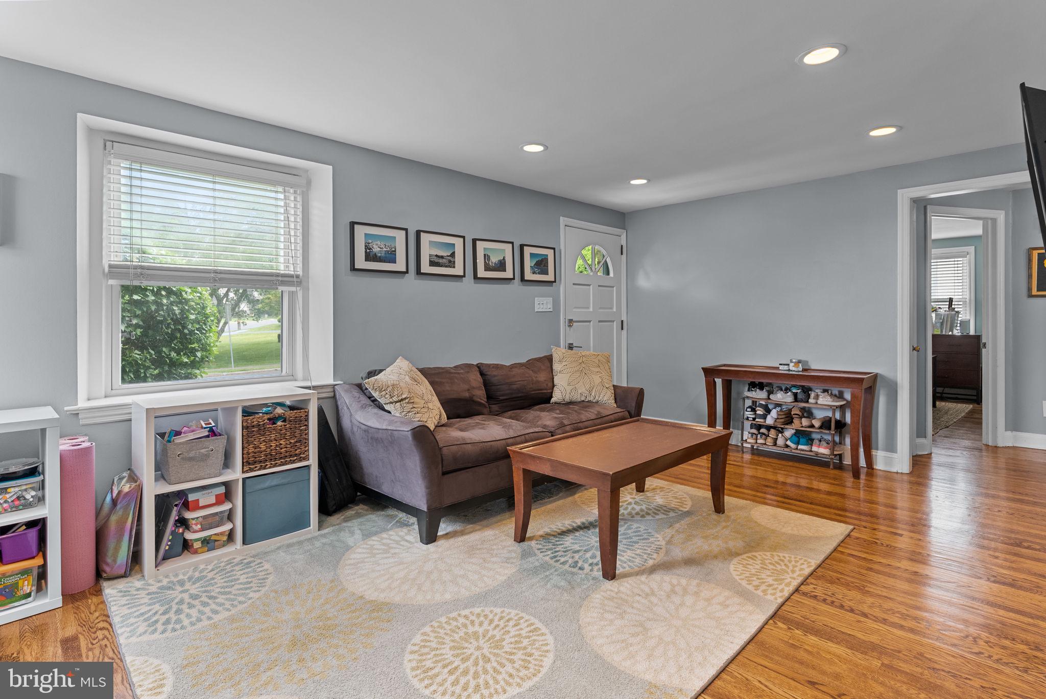116 South Highland Road Springfield, PA 19064 - Photo 8 of 42 a living room with furniture and a window