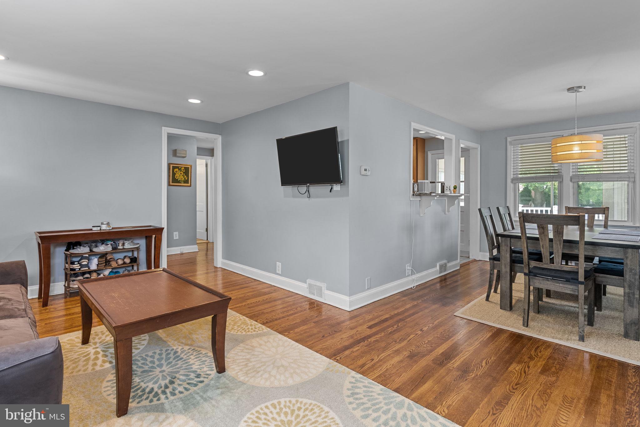 116 South Highland Road Springfield, PA 19064 - Photo 9 of 42 a living room with furniture and a flat screen tv