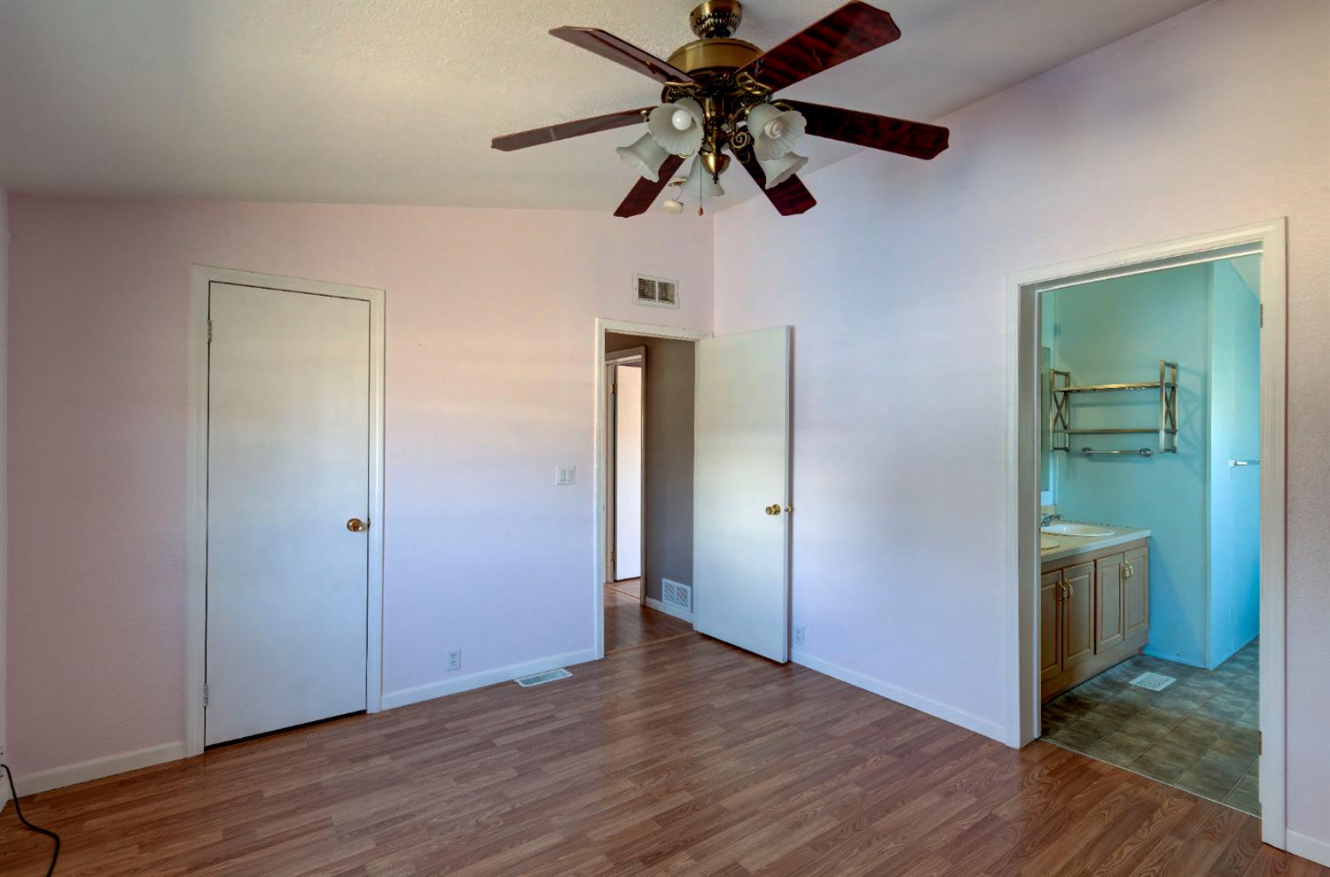 32748 Indian Guide Road Squaw Valley, CA 93675 - Photo 13 of 38 a view of an empty room and wooden floor