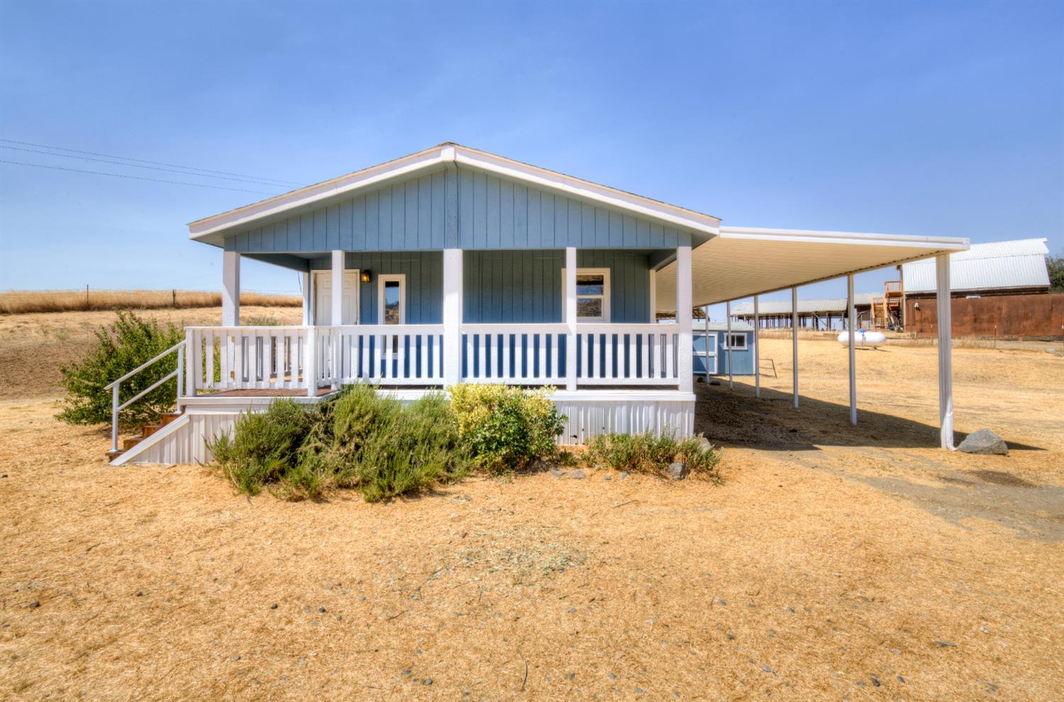 32748 Indian Guide Road Squaw Valley, CA 93675 - Photo 3 of 38 a view of a house with a yard