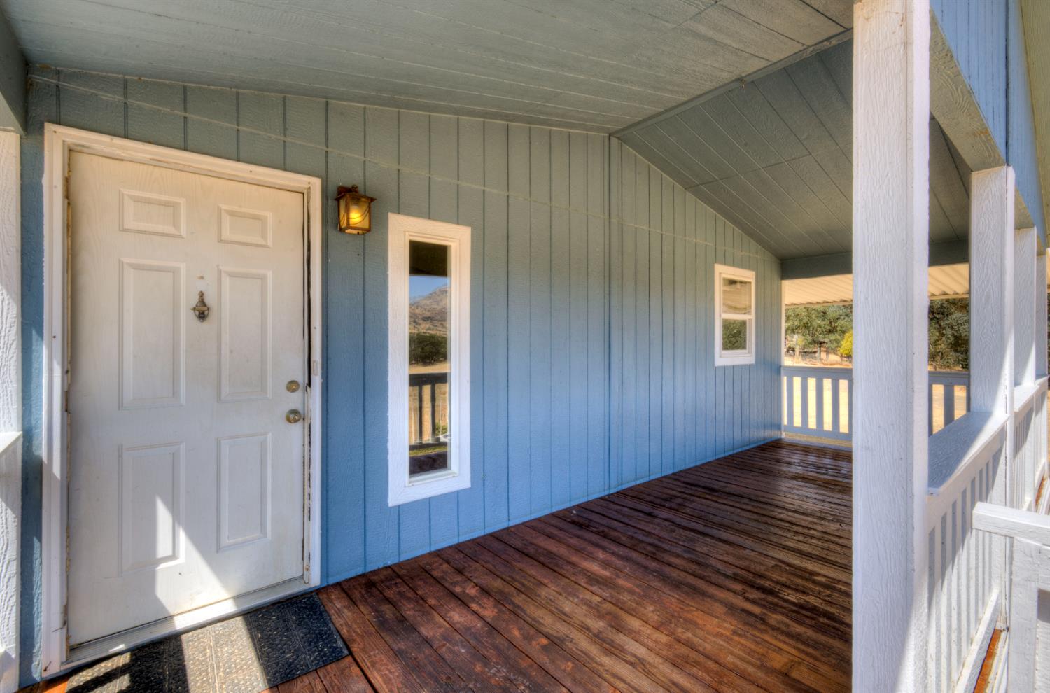 32748 Indian Guide Road Squaw Valley, CA 93675 - Photo 37 of 38 a view of a hallway with wooden floor and staircase