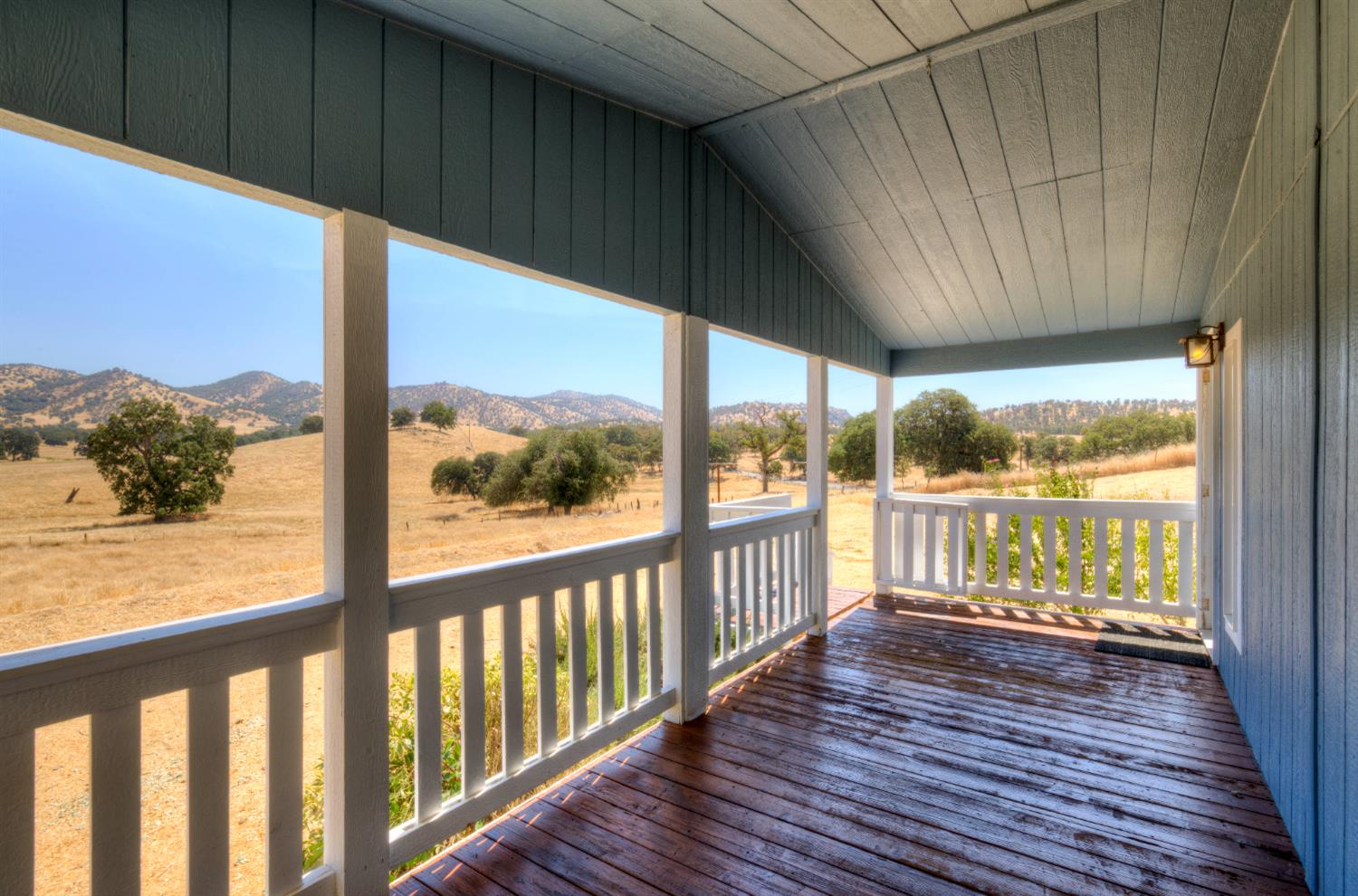 32748 Indian Guide Road Squaw Valley, CA 93675 - Photo 5 of 38 a view of a balcony with wooden floor