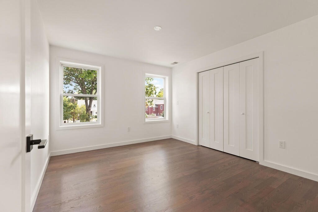 70 Walker Street, Unit 4 Newton, MA 02460 - Photo 20 of 35 an empty room with windows