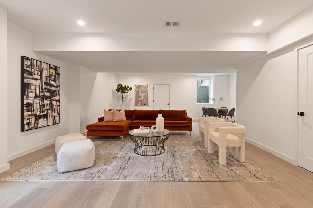 70 Walker Street, Unit 4 Newton, MA 02460 - Photo 23 of 35 a living room with furniture and wooden floor