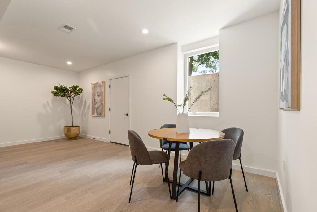70 Walker Street, Unit 4 Newton, MA 02460 - Photo 26 of 35 a view of a dining room with furniture
