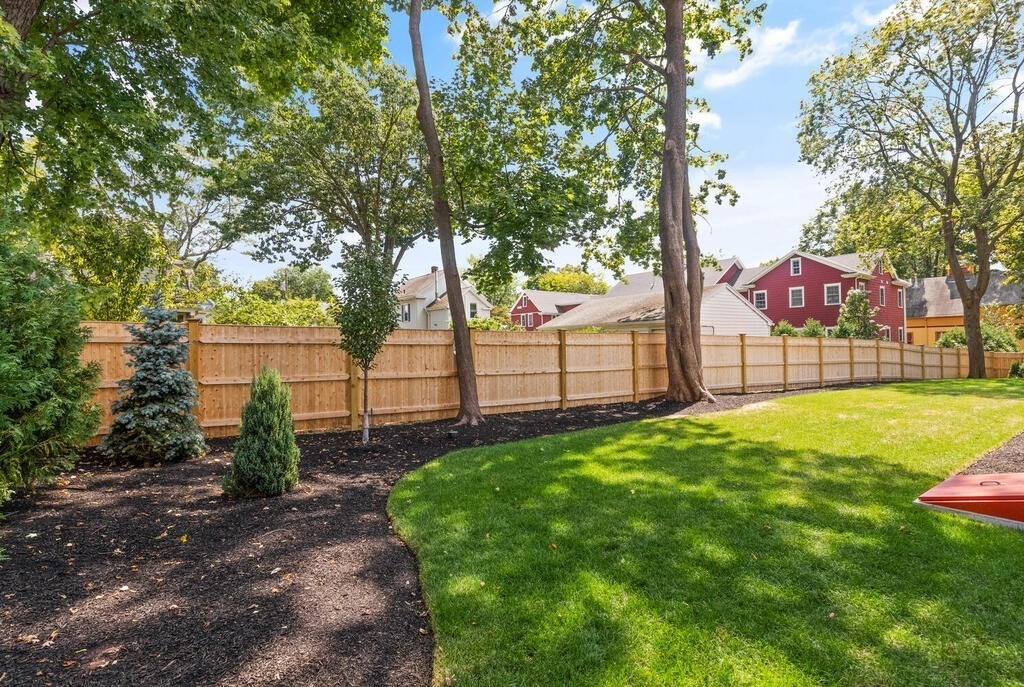 70 Walker Street, Unit 4 Newton, MA 02460 - Photo 29 of 35 a view of a backyard with large tree