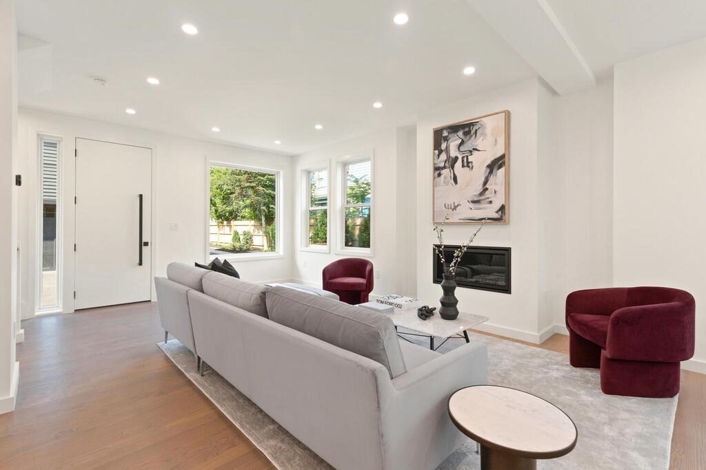 70 Walker Street, Unit 4 Newton, MA 02460 - Photo 3 of 35 a living room with fireplace furniture and a large window