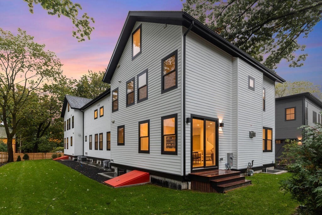 70 Walker Street, Unit 4 Newton, MA 02460 - Photo 35 of 35 a front view of a house with a garden