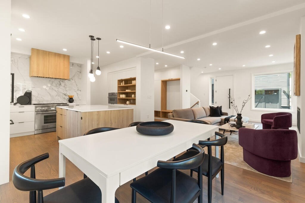 70 Walker Street, Unit 4 Newton, MA 02460 - Photo 8 of 35 a large kitchen with a table and chairs