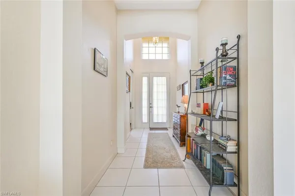 a view of a hallway with windows