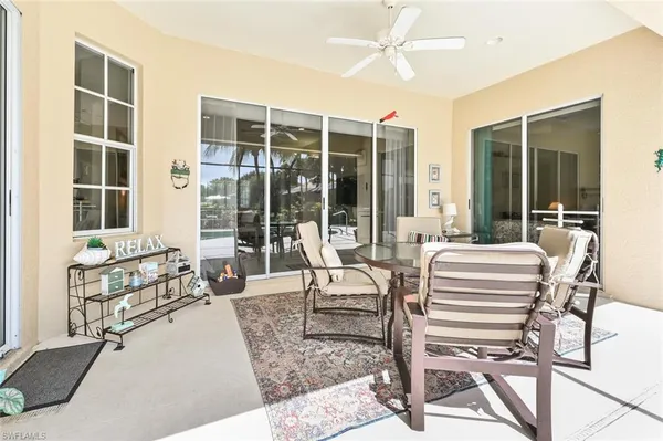 a view of a dining room with furniture window and outside view