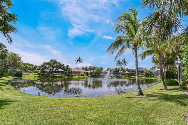a view of a lake with a big yard