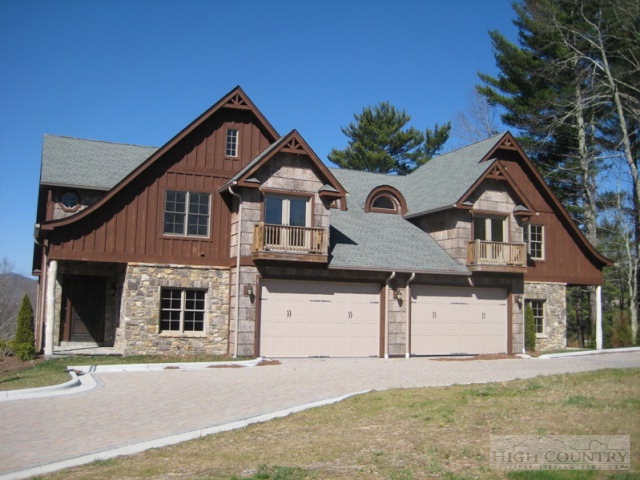 front view of a house with a street