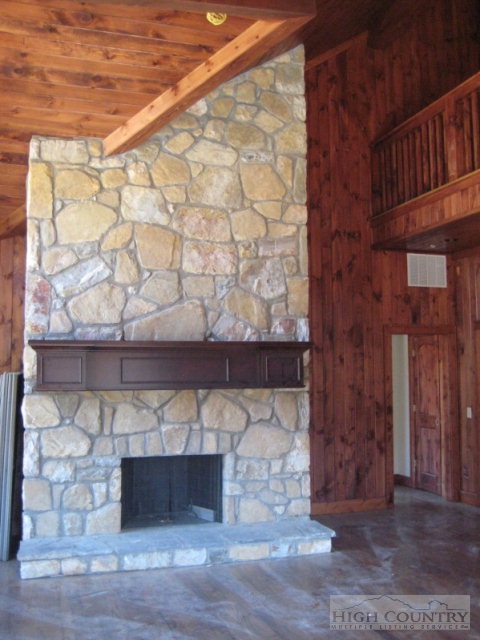 145-8 Banner Road Southwest, Unit 8 Banner Elk, NC 28604 - Photo 16 of 22 a room with a fireplace