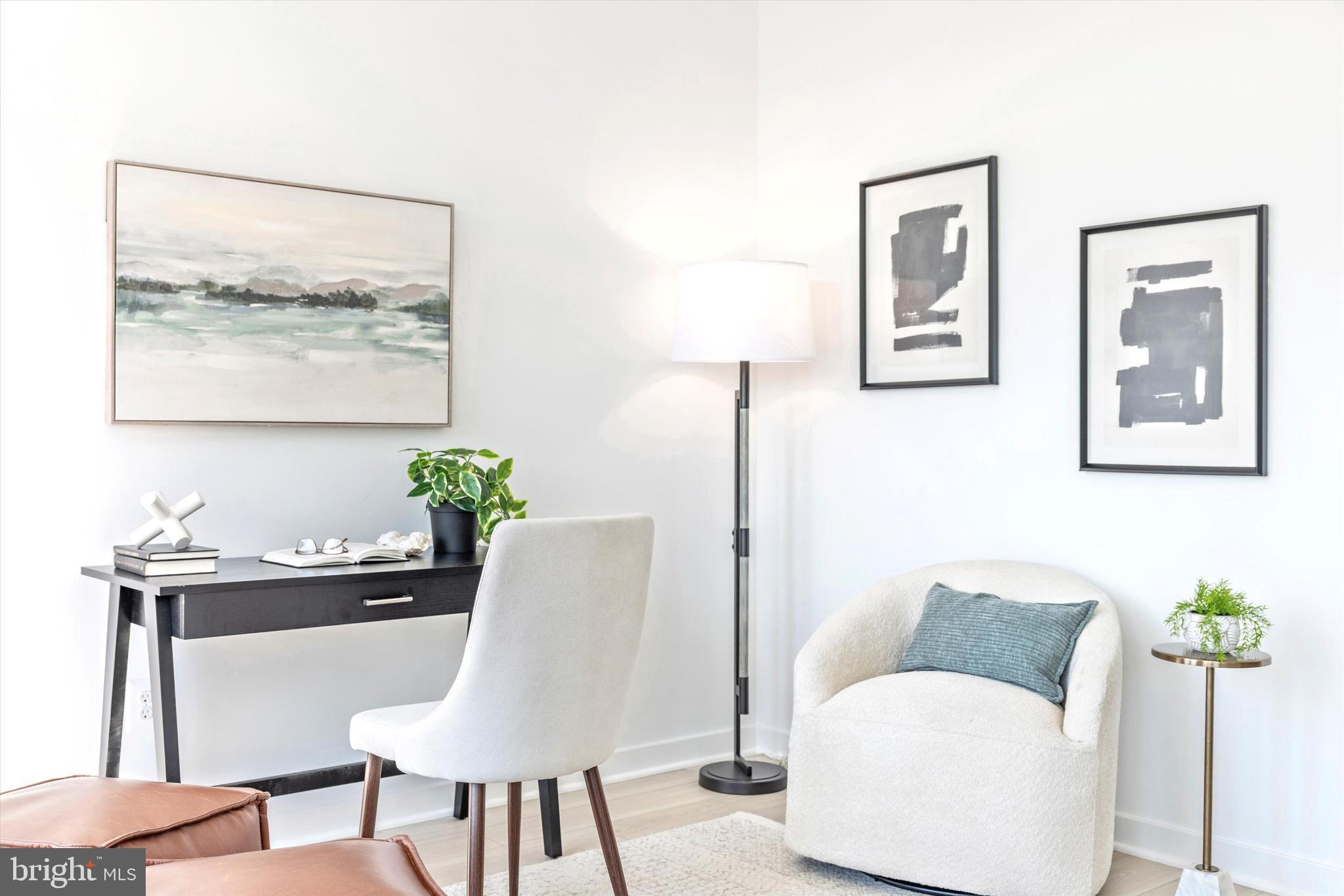 1631 A Blacksmith Way Frederick, MD 21702 - Photo 22 of 35 a view of a dining room with furniture and wooden floor