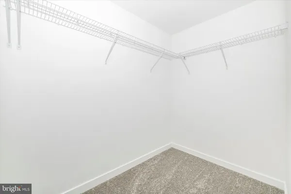 a view of small space with racks on the wall