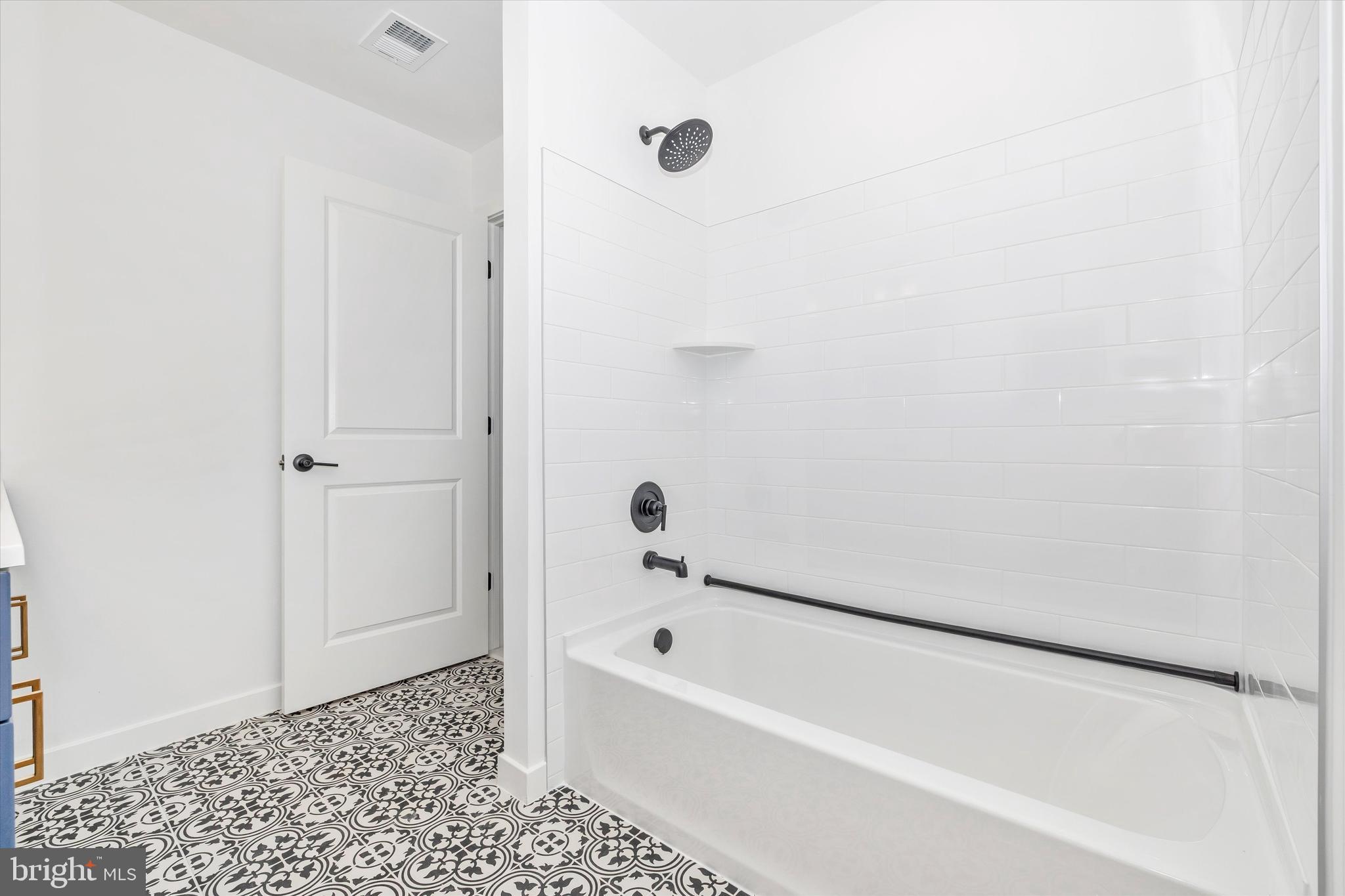 1631 A Blacksmith Way Frederick, MD 21702 - Photo 35 of 35 a bathroom with a bathtub