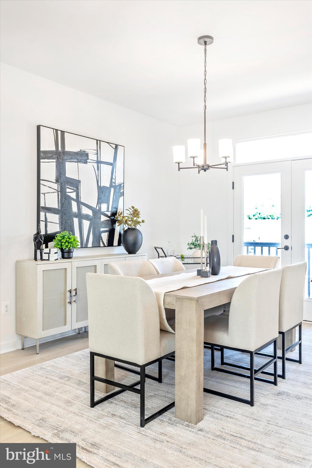1631 A Blacksmith Way Frederick, MD 21702 - Photo 10 of 35 a view of a dining room with furniture window and wooden floor