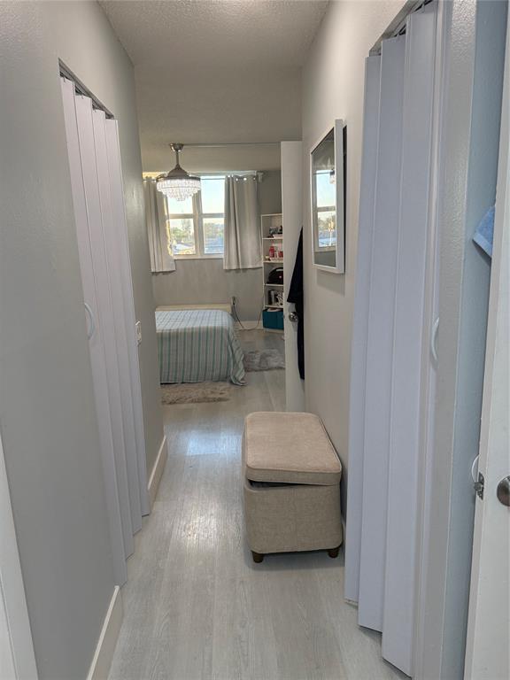 9360 Lime Bay Boulevard, Unit 202 Tamarac, FL 33321 - Photo 8 of 15 a living room with furniture and a window