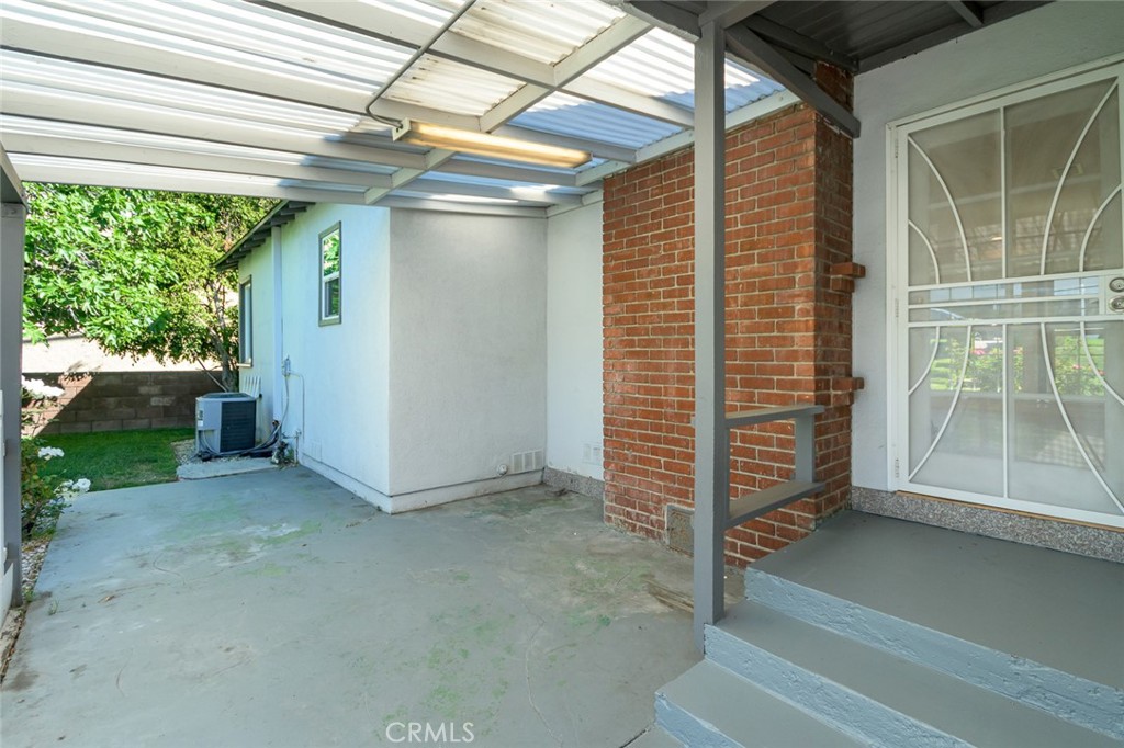 2111 North Verdugo Road Glendale, CA 91208 - Photo 44 of 53 a view of a porch with wooden walls and floor to ceiling window