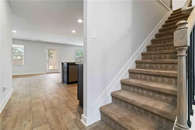 a view of entryway with wooden floor