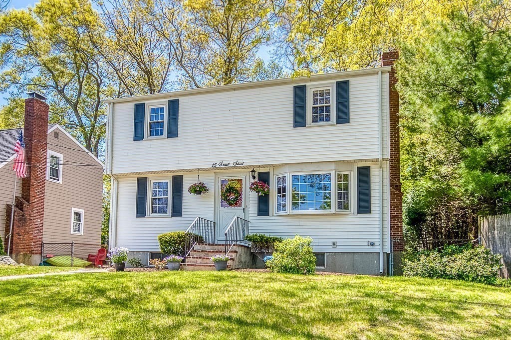 a front view of house with yard