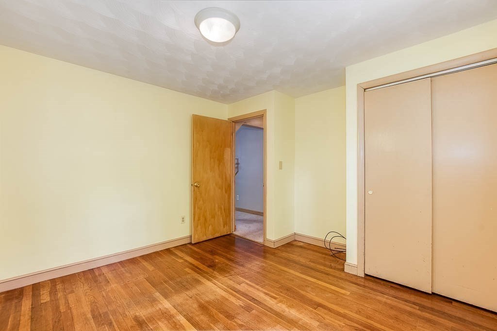 15 Locust Street Dedham, MA 02026 - Photo 18 of 38 a view of an empty room