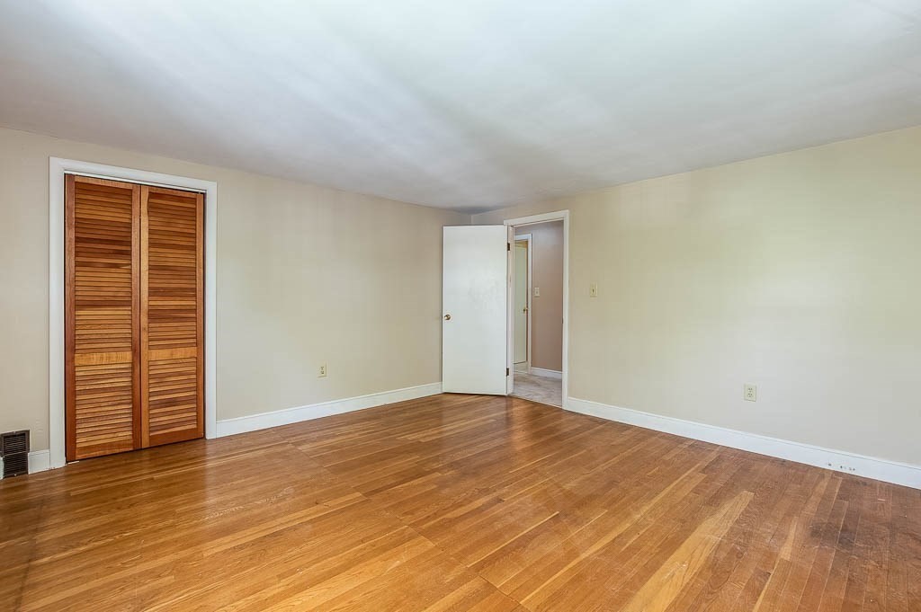 15 Locust Street Dedham, MA 02026 - Photo 22 of 38 wooden floor in an empty room