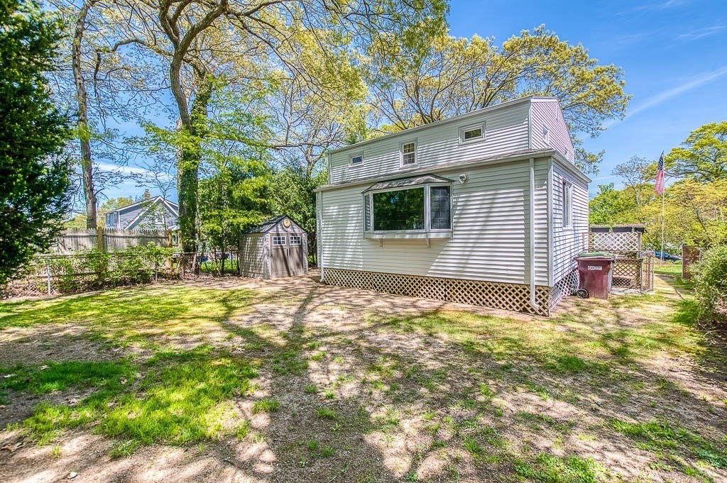 15 Locust Street Dedham, MA 02026 - Photo 33 of 38 a view of a backyard