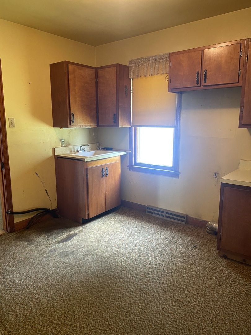 29217 Old Chicago Road La Moille, IL 61330 - Photo 15 of 34 an empty room with a window