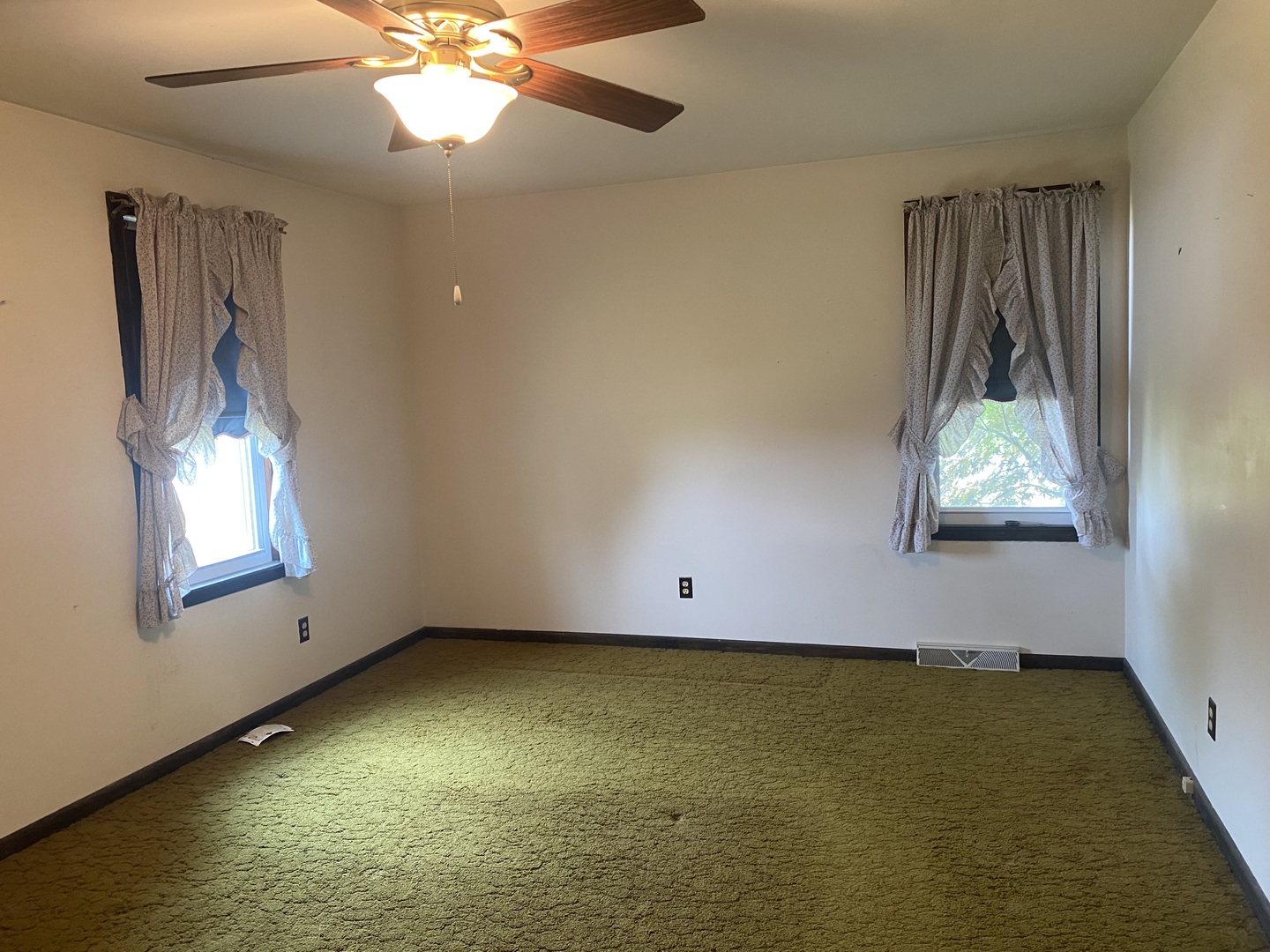29217 Old Chicago Road La Moille, IL 61330 - Photo 16 of 34 a view of room with window and ceiling fan