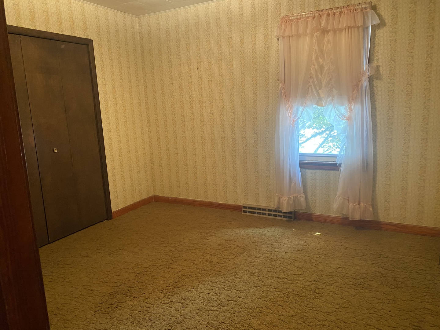 29217 Old Chicago Road La Moille, IL 61330 - Photo 17 of 34 a view of an empty room with a window