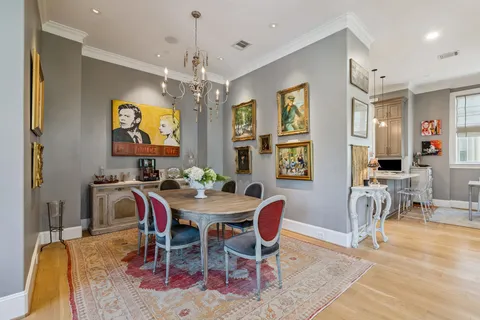 a view of a dining room with furniture