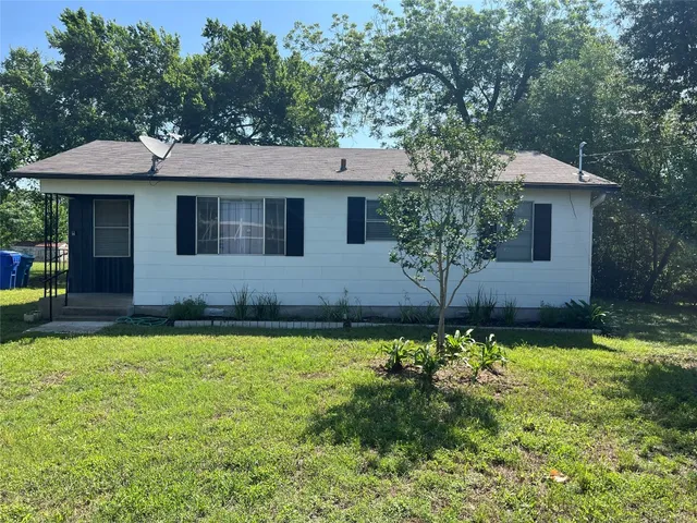 a house that has a lot of plants in it