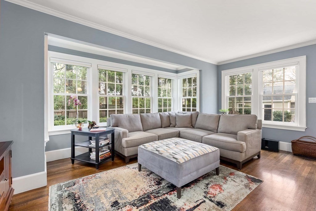 22 Barnstable Road Newton, MA 02465 - Photo 16 of 41 a living room with furniture and a large window